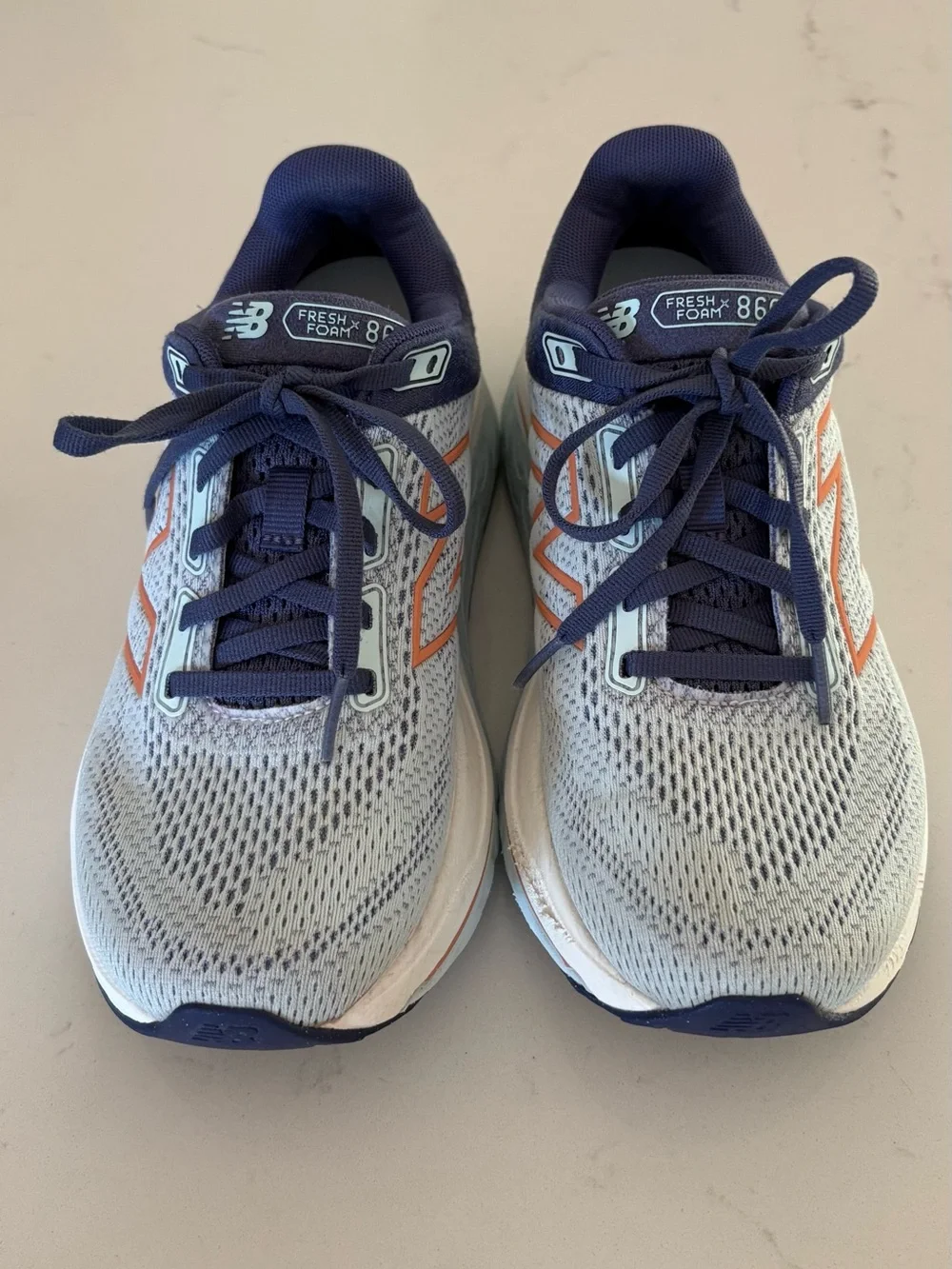 New Balance Women’s Running Sneakers - Light Blue, Navy & Coral Accents.